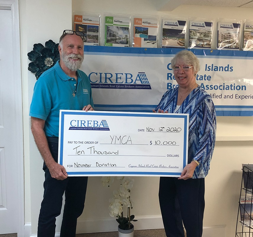 "Home is Where the Heart is" donates CI$10,000 to the YMCA of the Cayman Islands  NOVEMBER DONATION