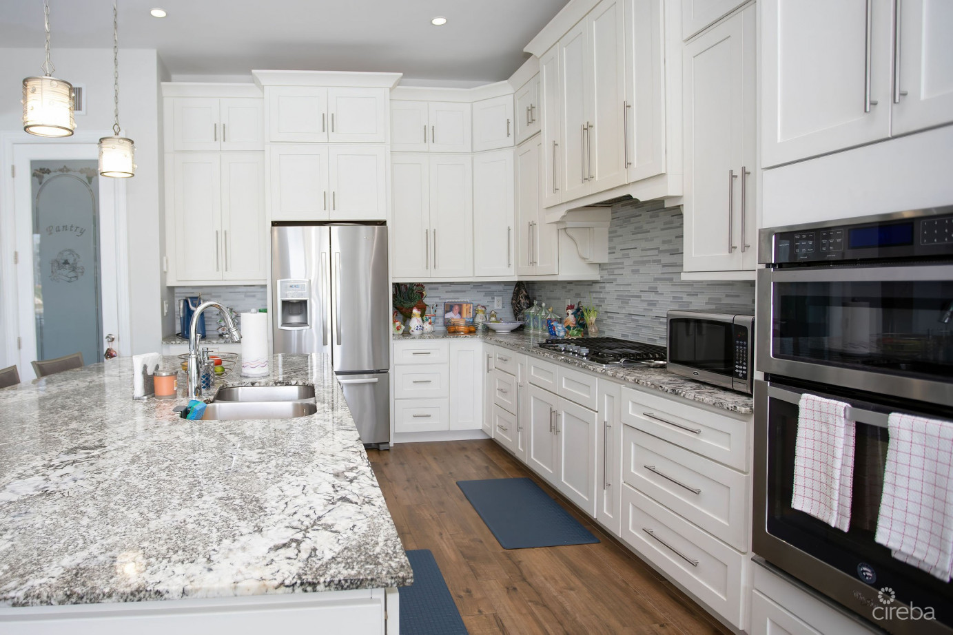 Crystal Harbour Luxury 5br/5.5ba Canal Front Home