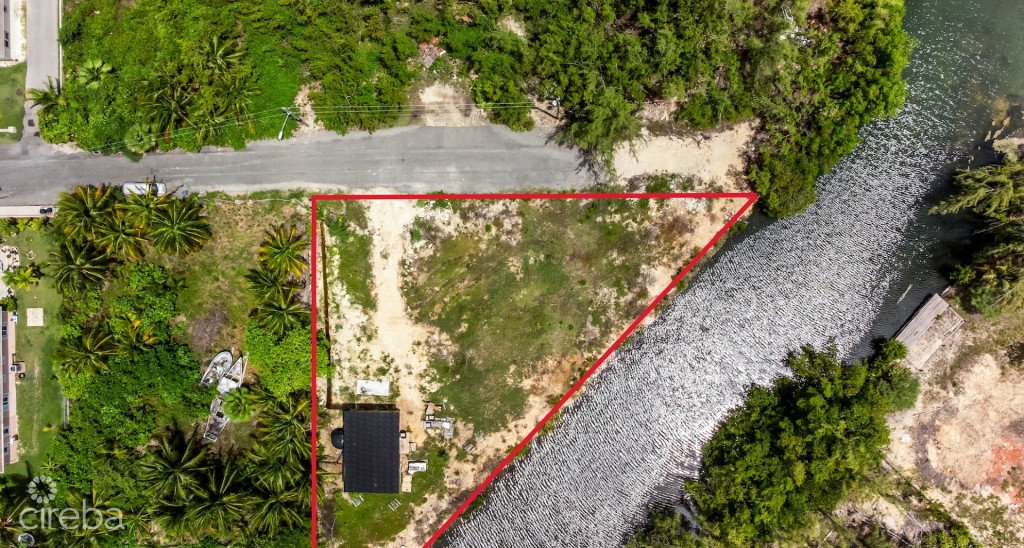 Chinaberry Drive Canal Front Lot