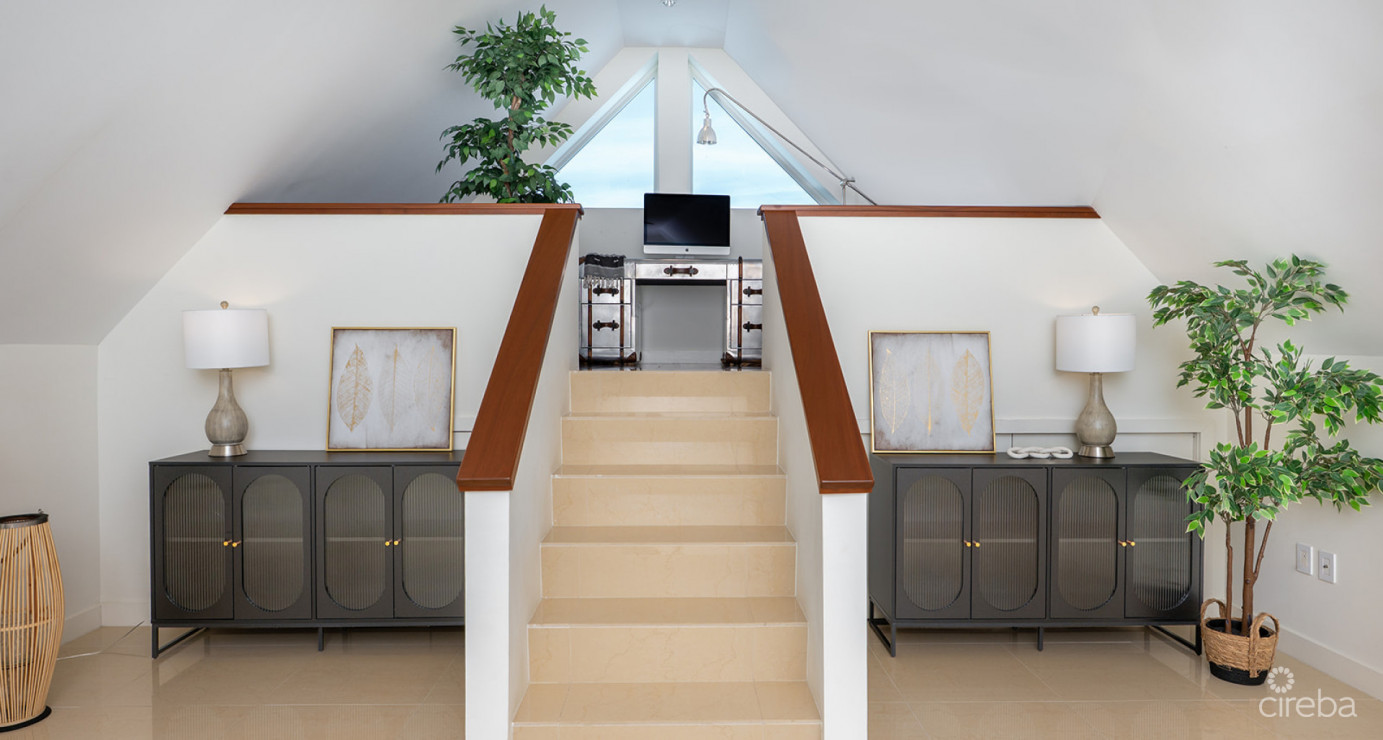 Elevated Elegance: Three-level Oceanfront Penthouse