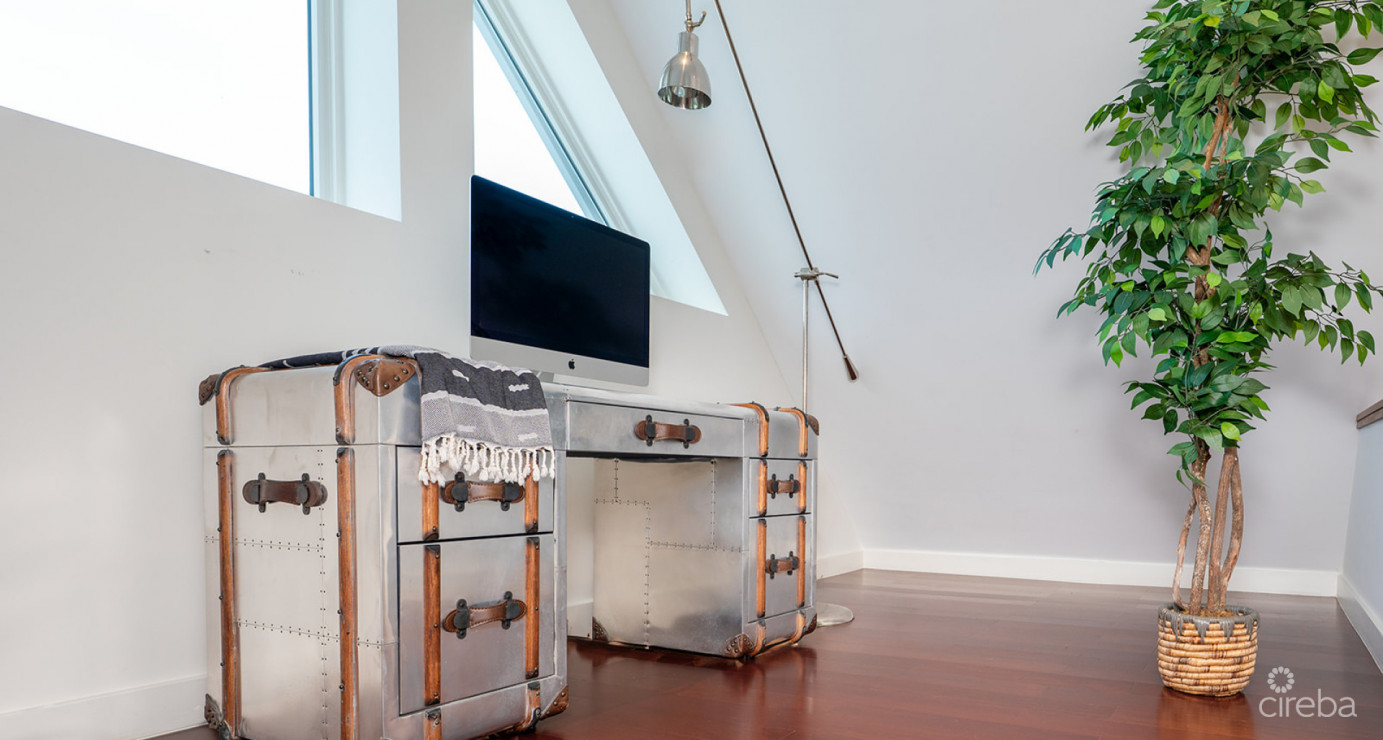 Elevated Elegance: Three-level Oceanfront Penthouse