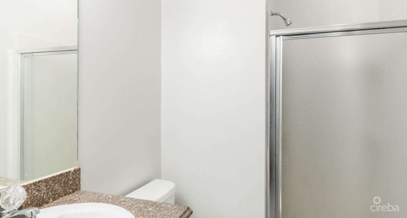 #48 Executive Suites  George Town - Investor Opportunity, 2 Bed Middle Unit