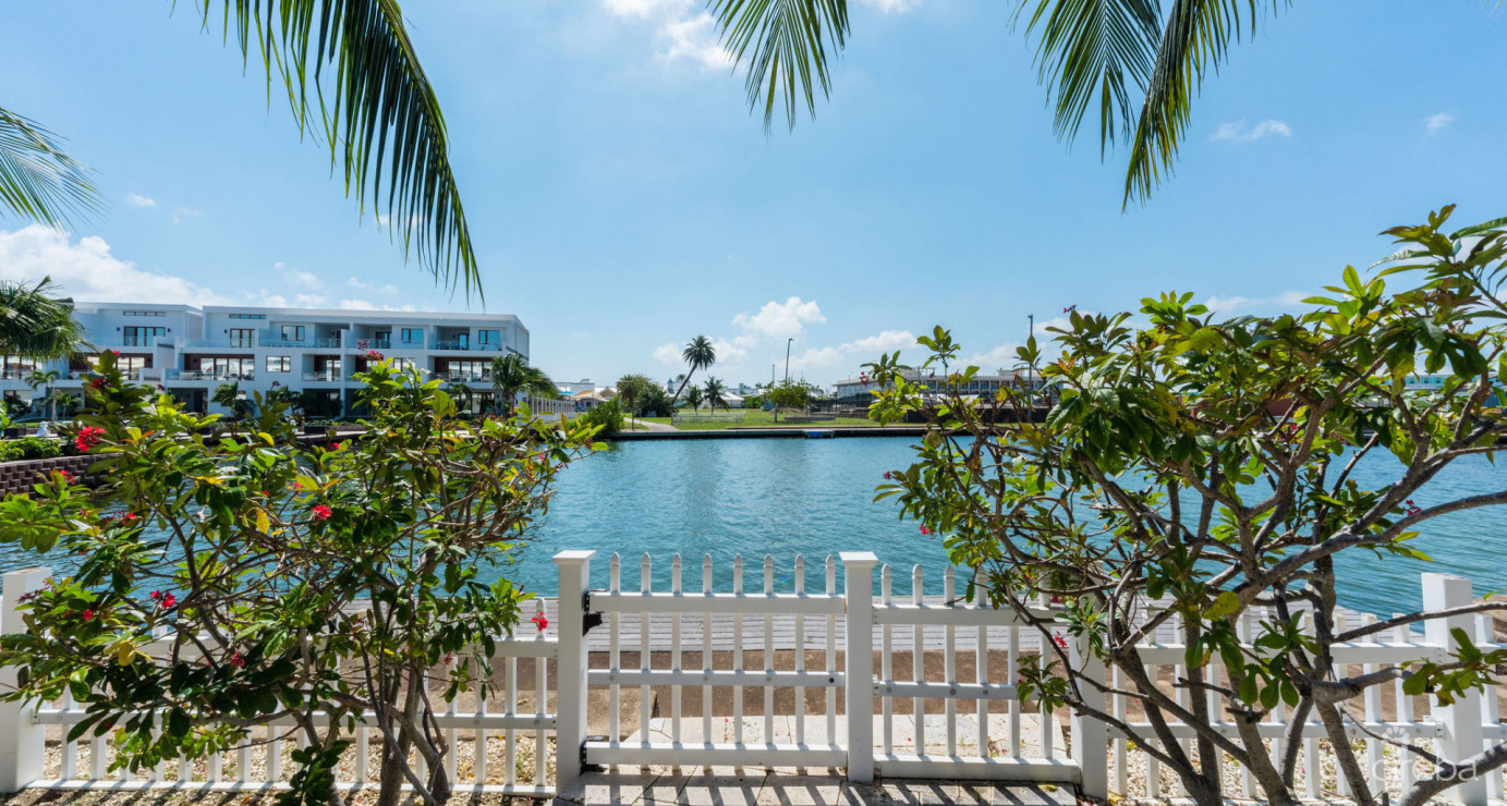 Gated Bimini Drive, Grand Harbour, Single Level 4 Bed Canal Front Home Reduced!