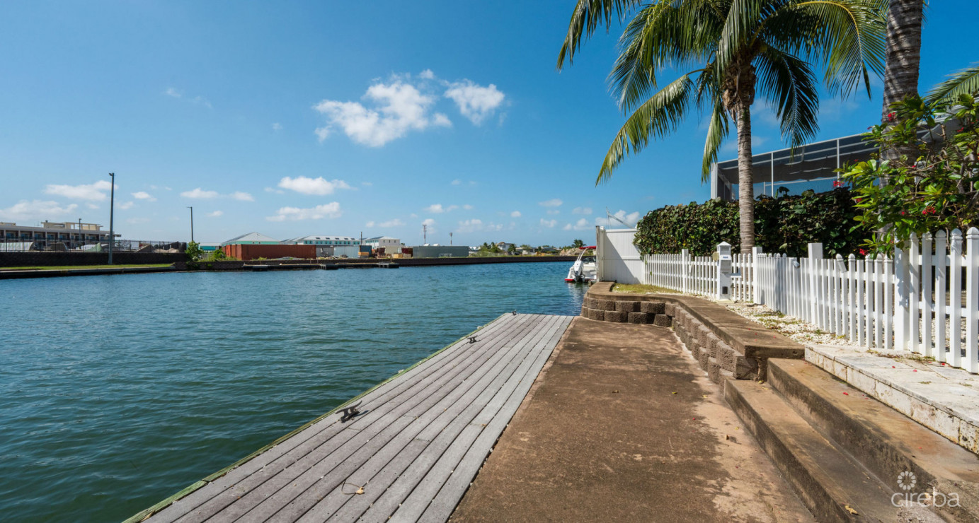 Gated Bimini Drive, Grand Harbour, Single Level 4 Bed Canal Front Home Reduced!