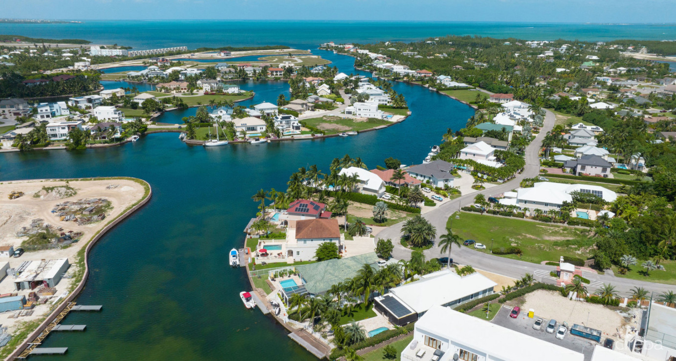 Gated Bimini Drive, Grand Harbour, Single Level 4 Bed Canal Front Home Reduced!