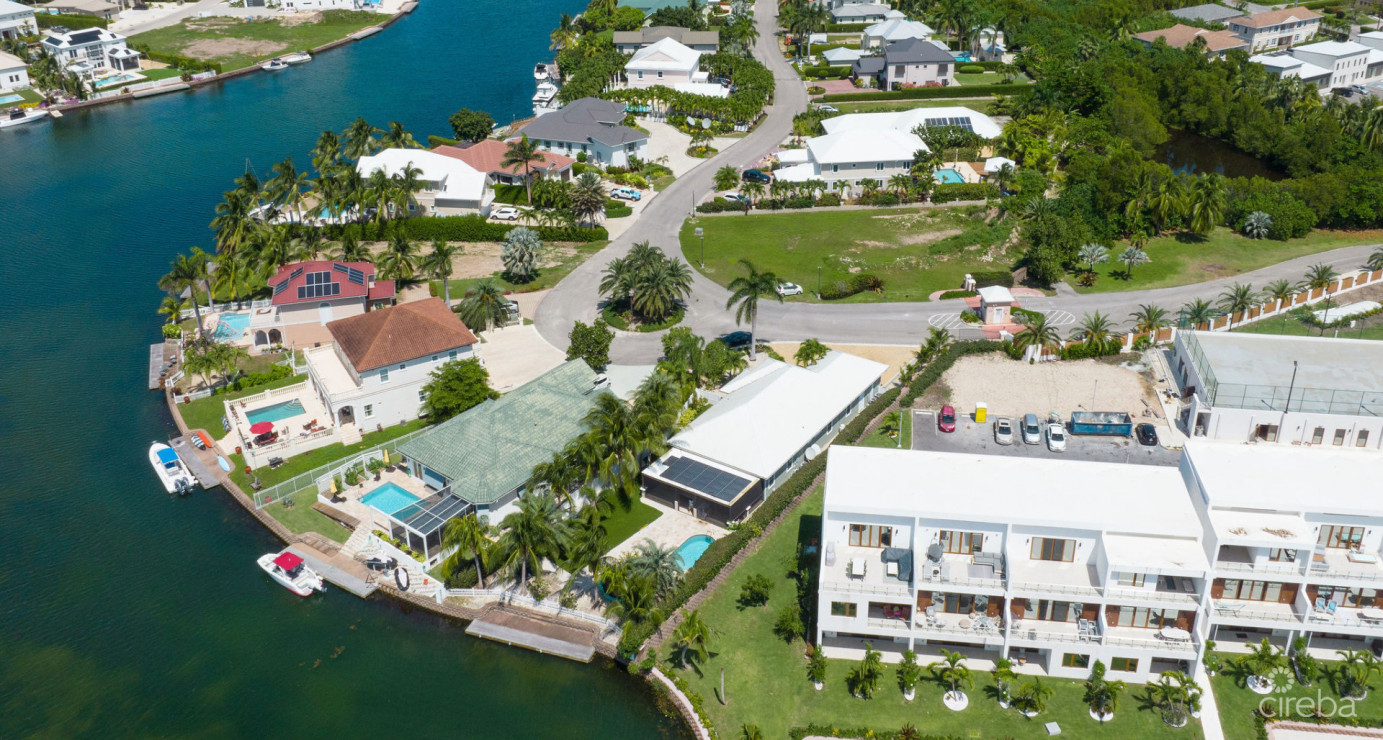 Gated Bimini Drive, Grand Harbour, Single Level 4 Bed Canal Front Home Reduced!