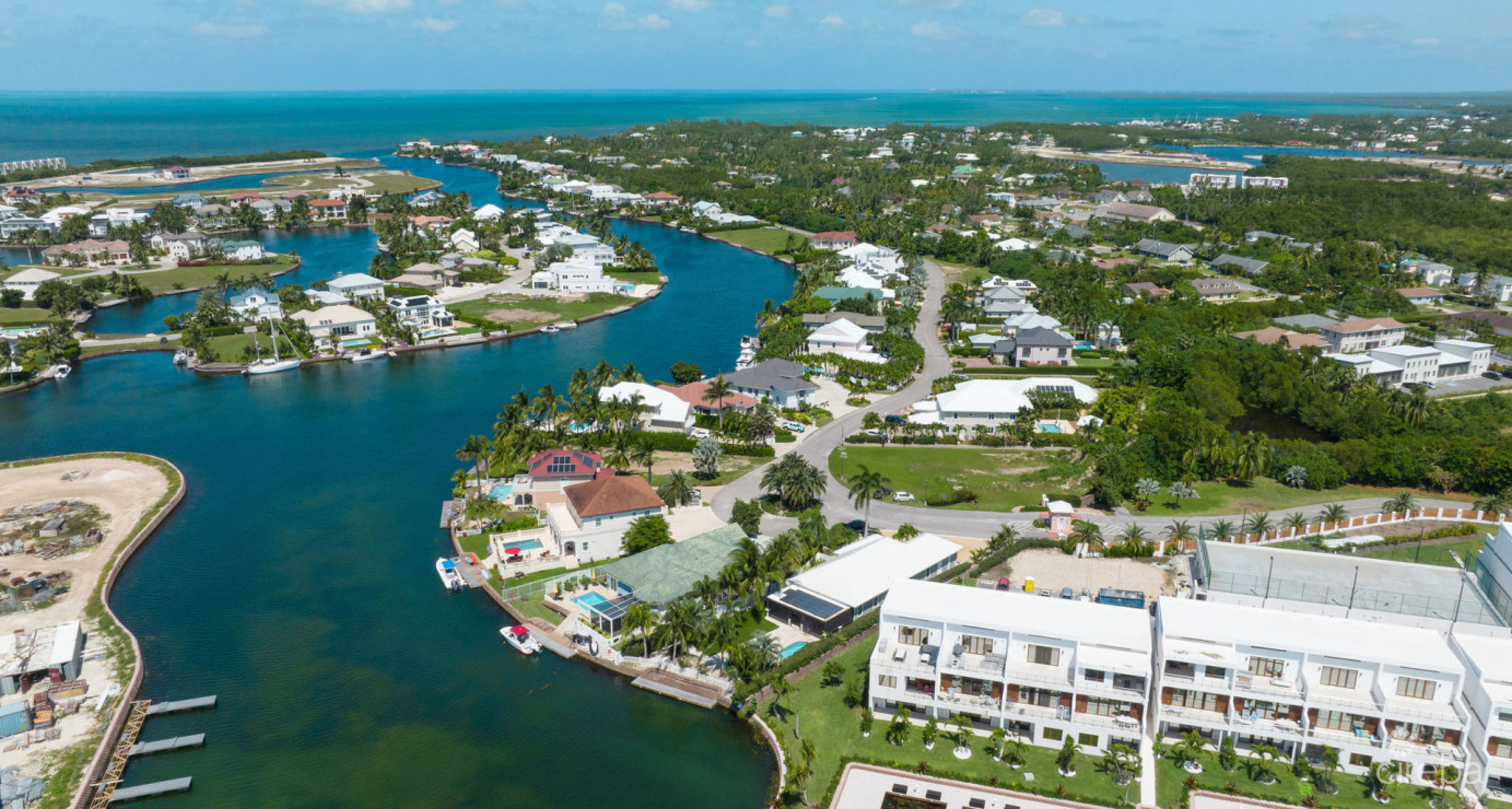 Gated Bimini Drive, Grand Harbour, Single Level 4 Bed Canal Front Home Reduced!