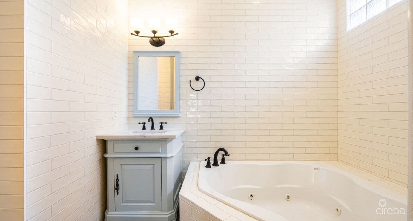 Gated Bimini Drive, Grand Harbour, Single Level 4 Bed Canal Front Home Reduced!