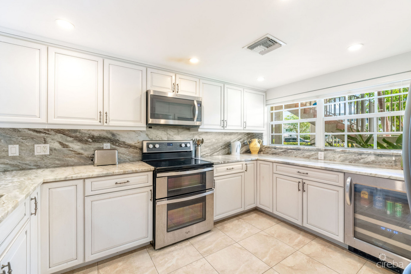 Britannia Lions Court  Unit #213 - Renovated 1-bedroom Garden View Condo