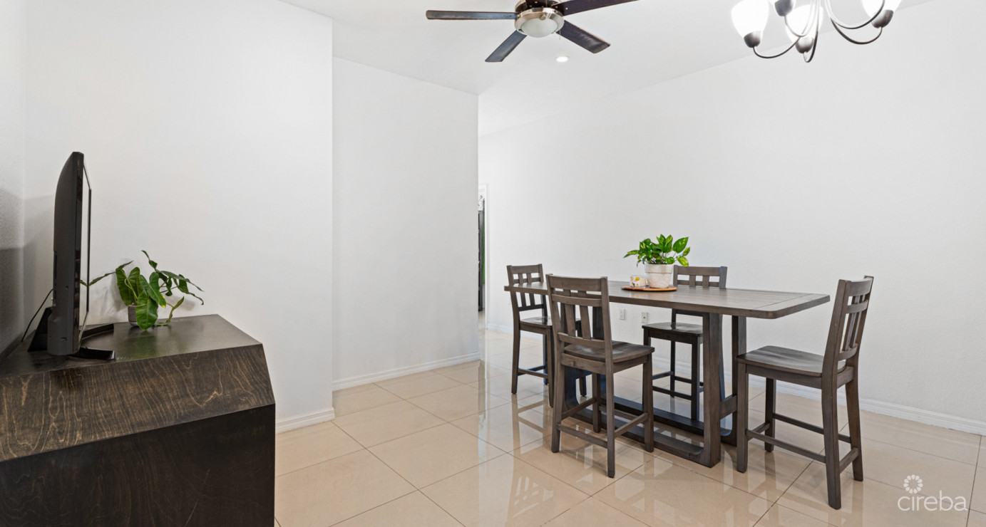 Spacious West Bay Family Home With Modern Extension, Mature Garden & Pickleball Court