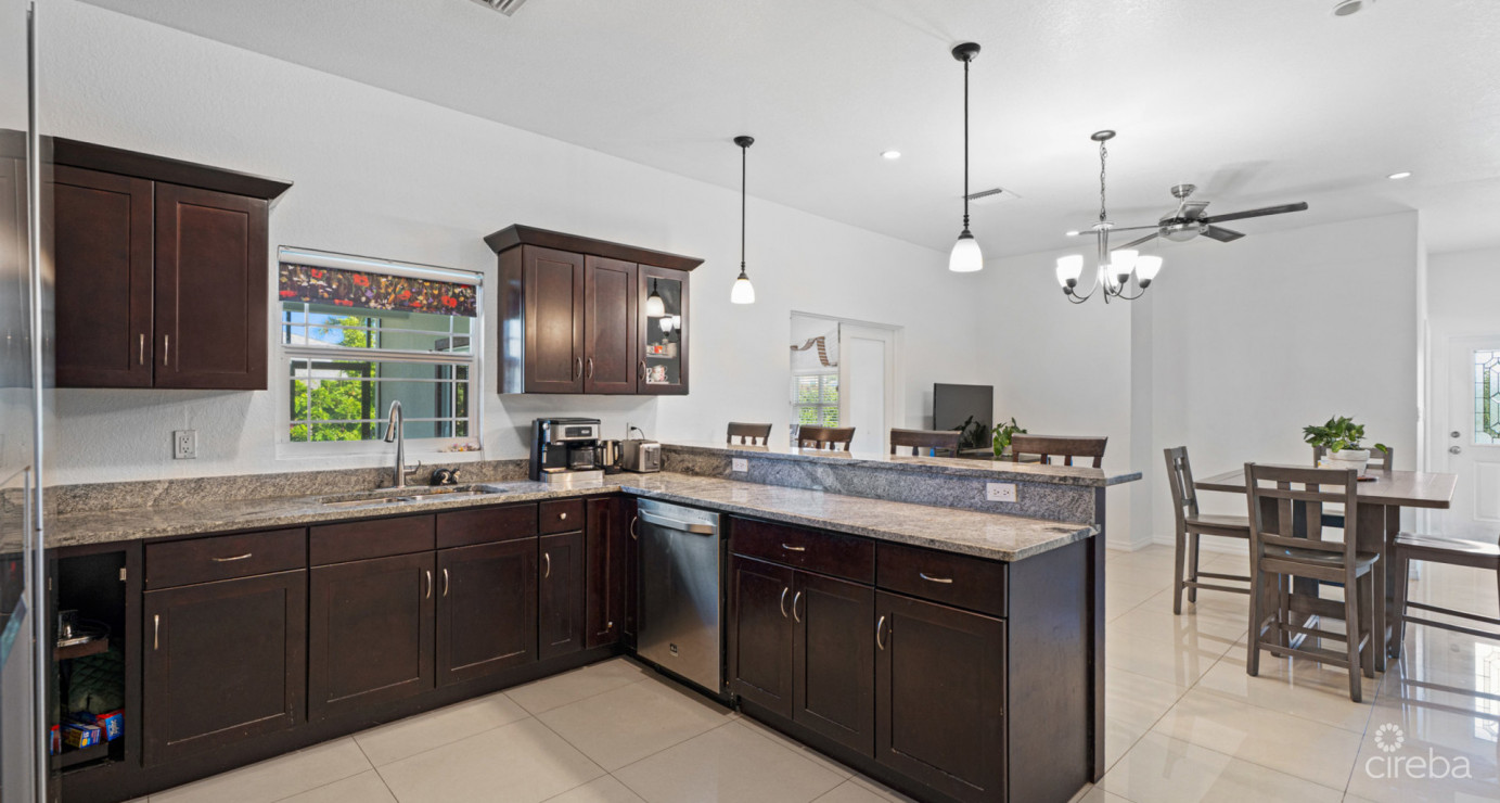 Spacious West Bay Family Home With Modern Extension, Mature Garden & Pickleball Court