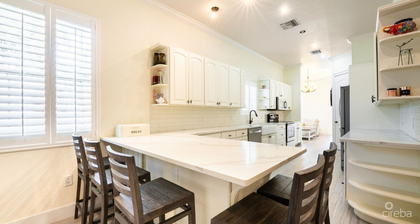 Gated Bimini Drive, Grand Harbour, Single Level 4 Bed Canal Front Home Reduced And Owner Financing!