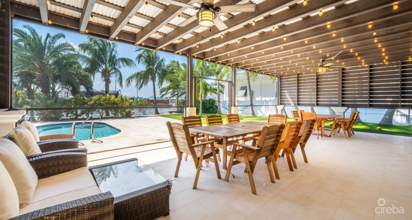 Gated Bimini Drive, Grand Harbour, Single Level 4 Bed Canal Front Home Reduced And Owner Financing!