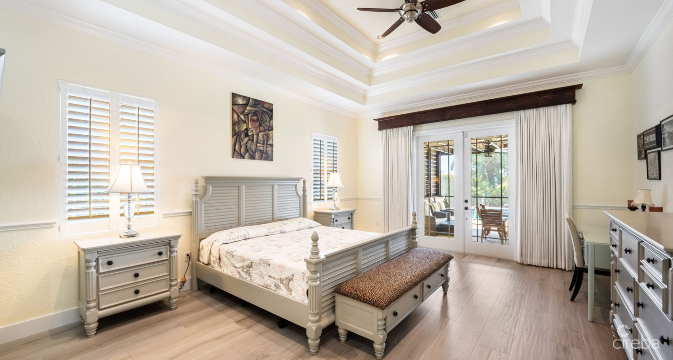 Gated Bimini Drive, Grand Harbour, Single Level 4 Bed Canal Front Home Reduced And Owner Financing!