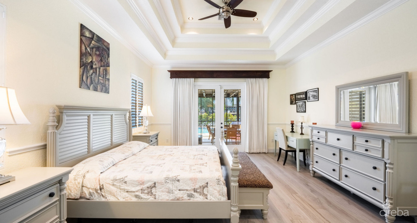 Gated Bimini Drive, Grand Harbour, Single Level 4 Bed Canal Front Home Reduced And Owner Financing!