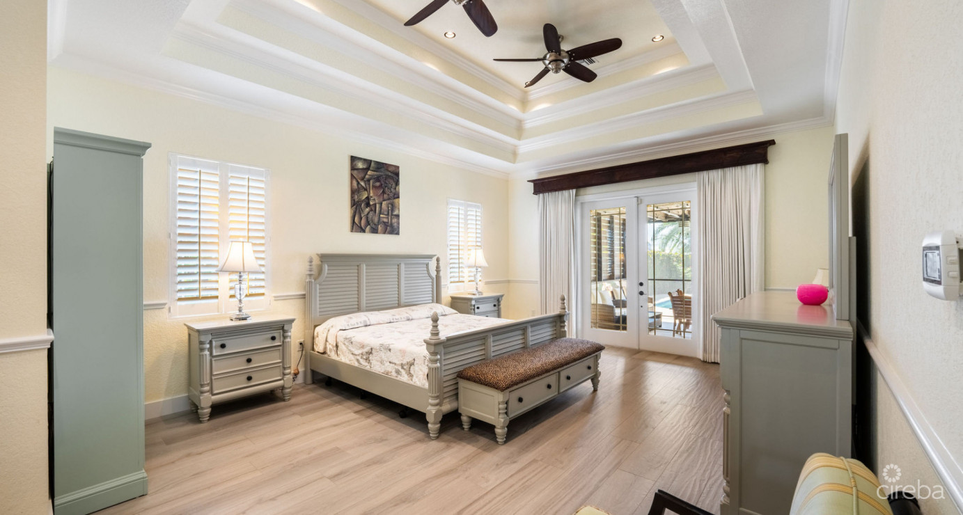 Gated Bimini Drive, Grand Harbour, Single Level 4 Bed Canal Front Home Reduced And Owner Financing!