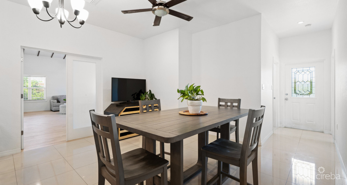 Spacious West Bay Family Home With Modern Extension, Mature Garden & Pickleball Court