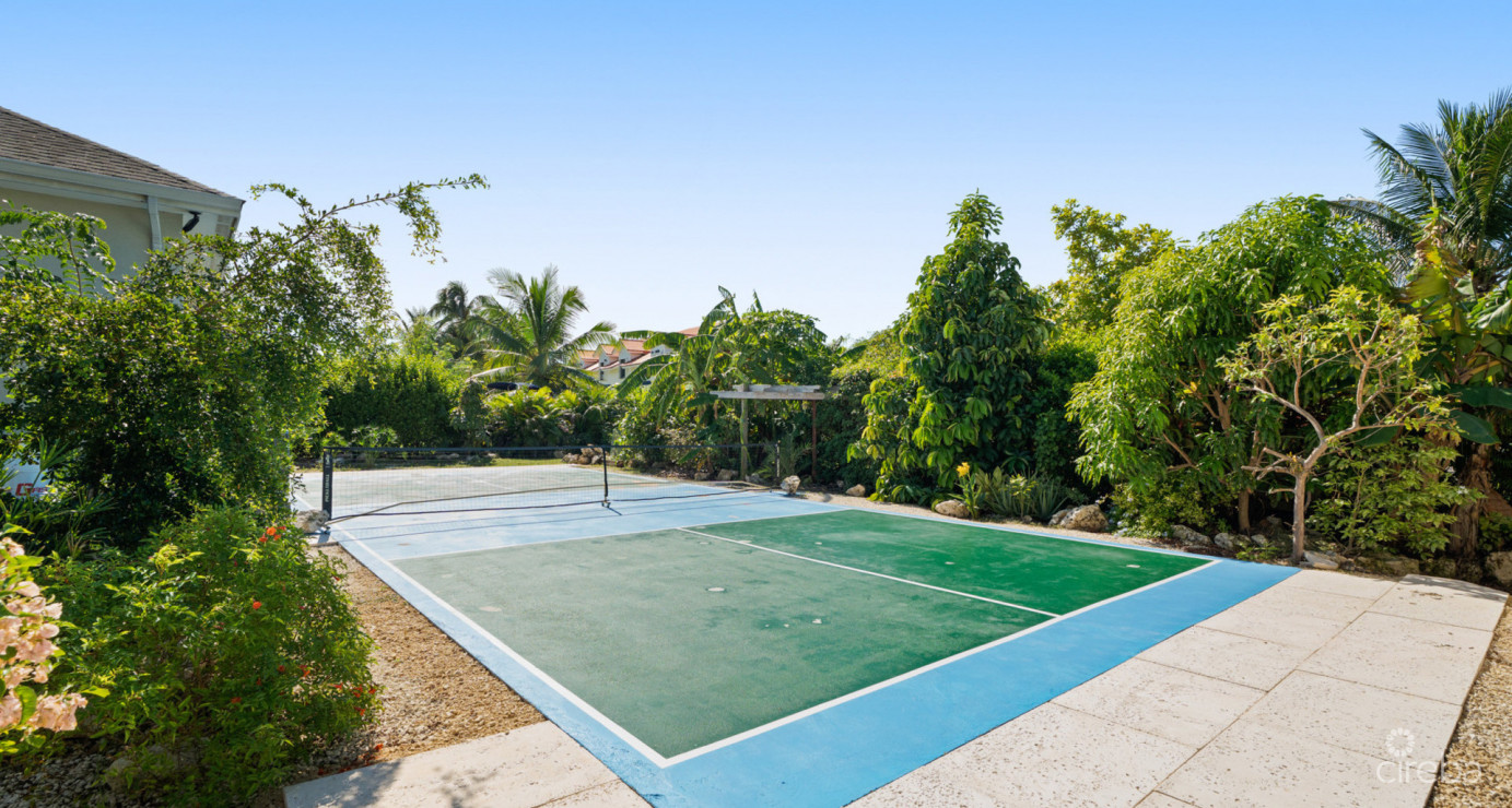 Spacious West Bay Family Home With Modern Extension, Mature Garden & Pickleball Court