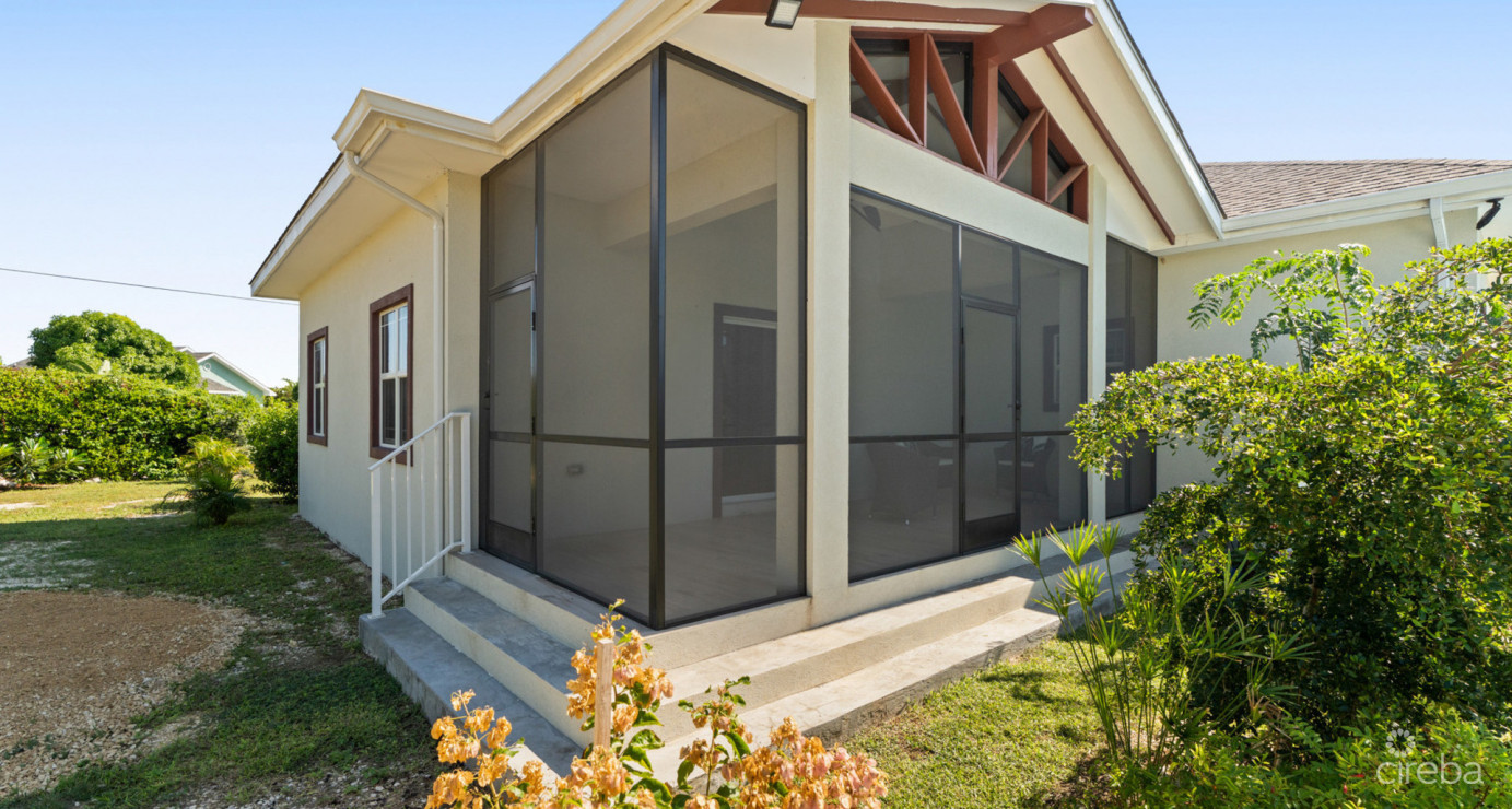 Spacious West Bay Family Home With Modern Extension, Mature Garden & Pickleball Court