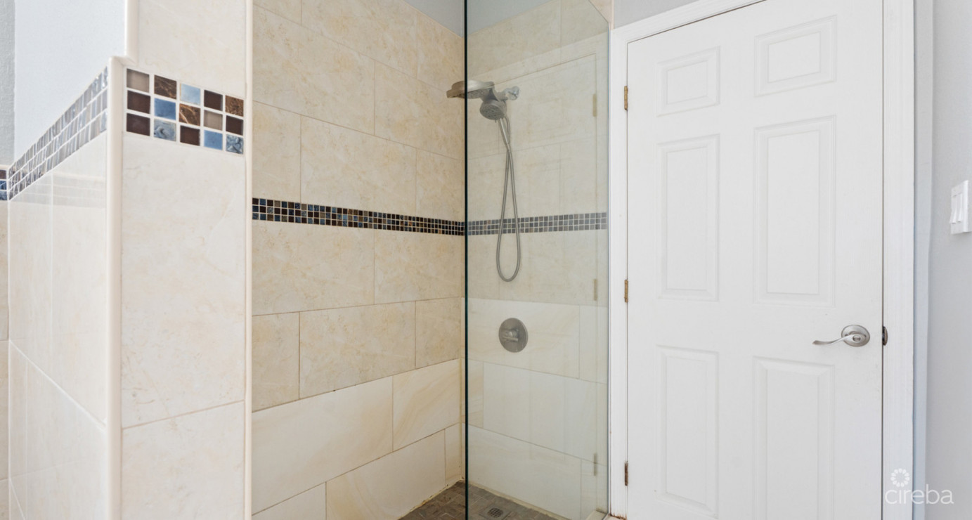 Spacious West Bay Family Home With Modern Extension, Mature Garden & Pickleball Court