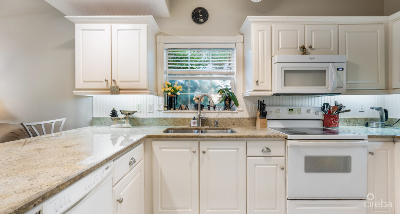 Regal Beach Club #312 + Garage