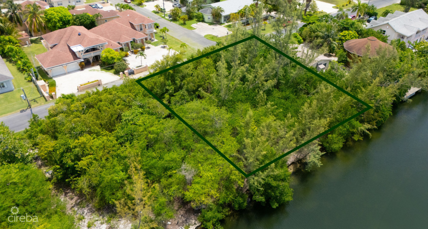 Omega Bay Canal Front Duplex/house Parcel (0.2984 Acre)