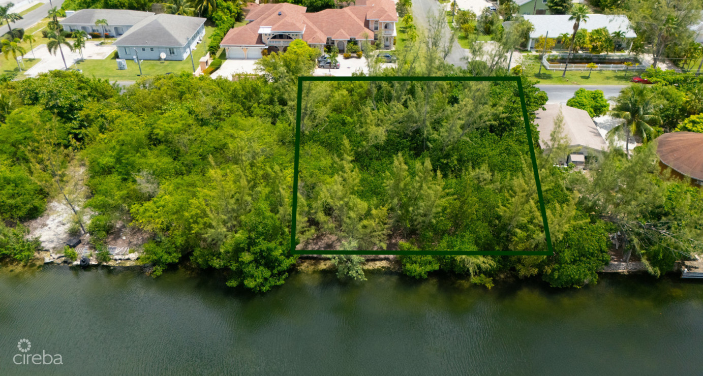 Omega Bay Canal Front Duplex/house Parcel (0.2984 Acre)