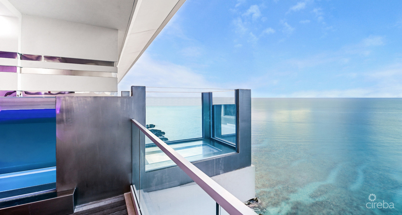 Ocean Front, Corner Unit At Fin Grand Cayman