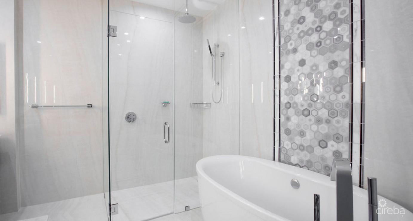 Ocean Front, Corner Unit At Fin Grand Cayman