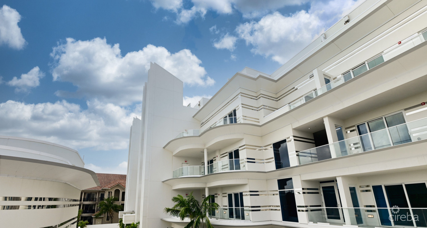 Ocean Front, Corner Unit At Fin Grand Cayman