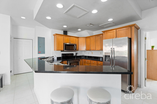 East End Paradise Villas.  3 Bed, 3 Bath + Den With Private Beach