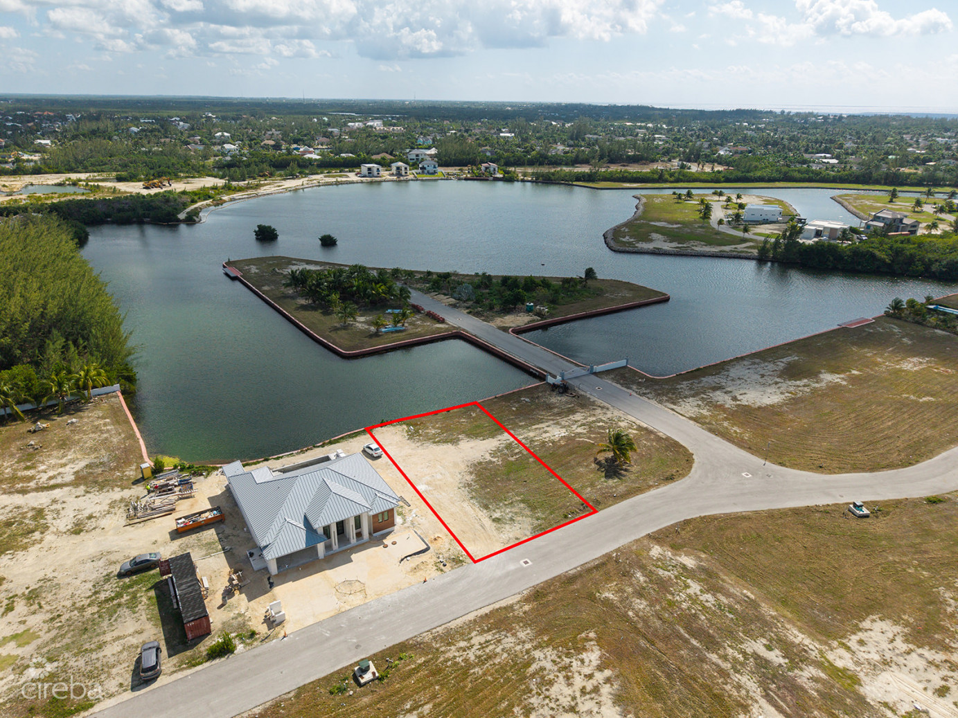 0.24 Acre Canal Lot In Gated Community - Mustique Cove