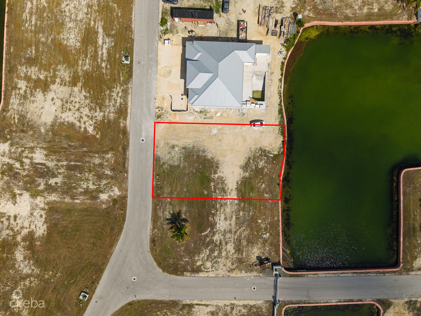 0.24 Acre Canal Lot In Gated Community - Mustique Cove