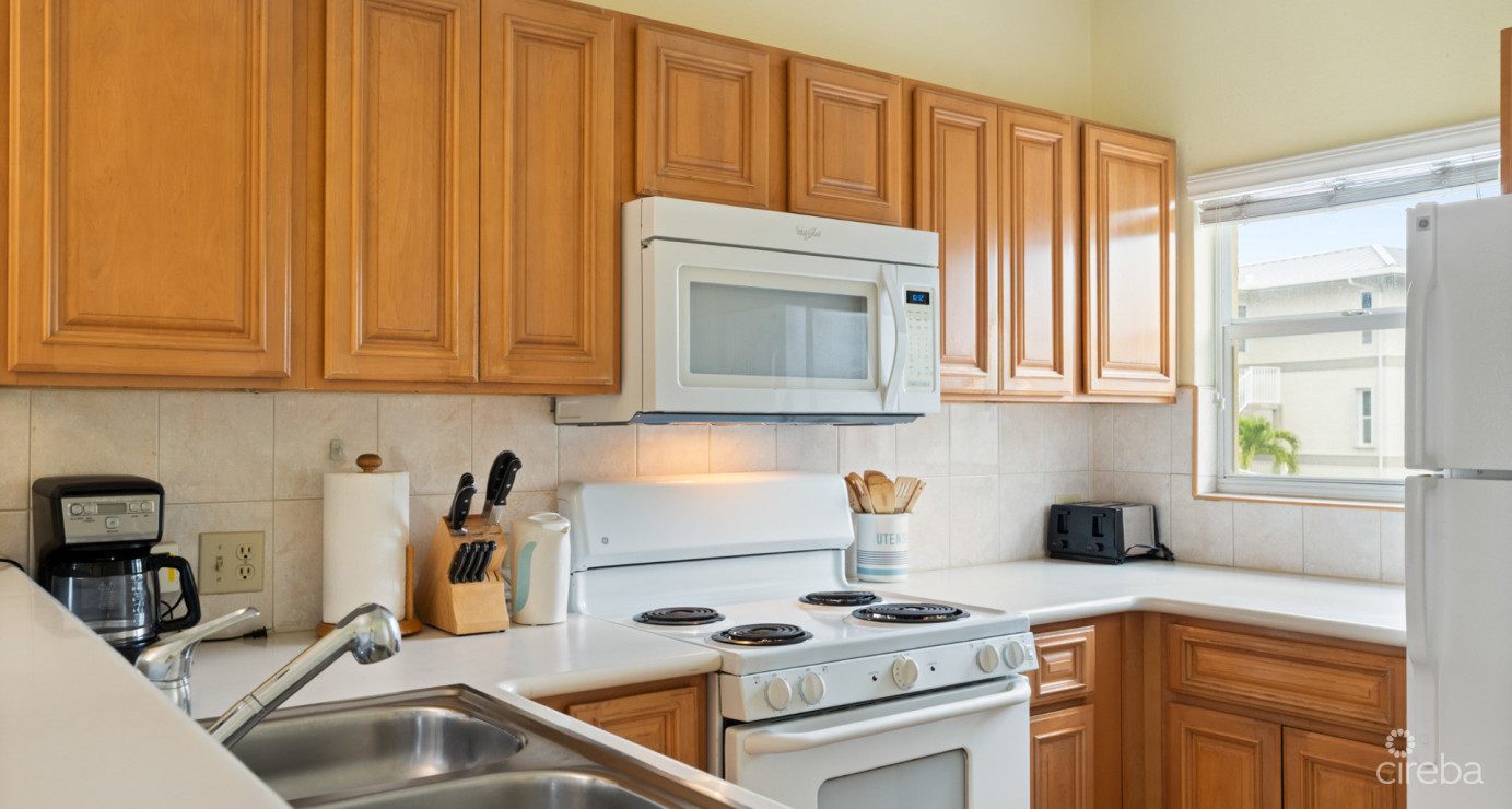 Plantation Village #44  Seven Mile Beach - Pool & Garden View Condo With Great Rental Income