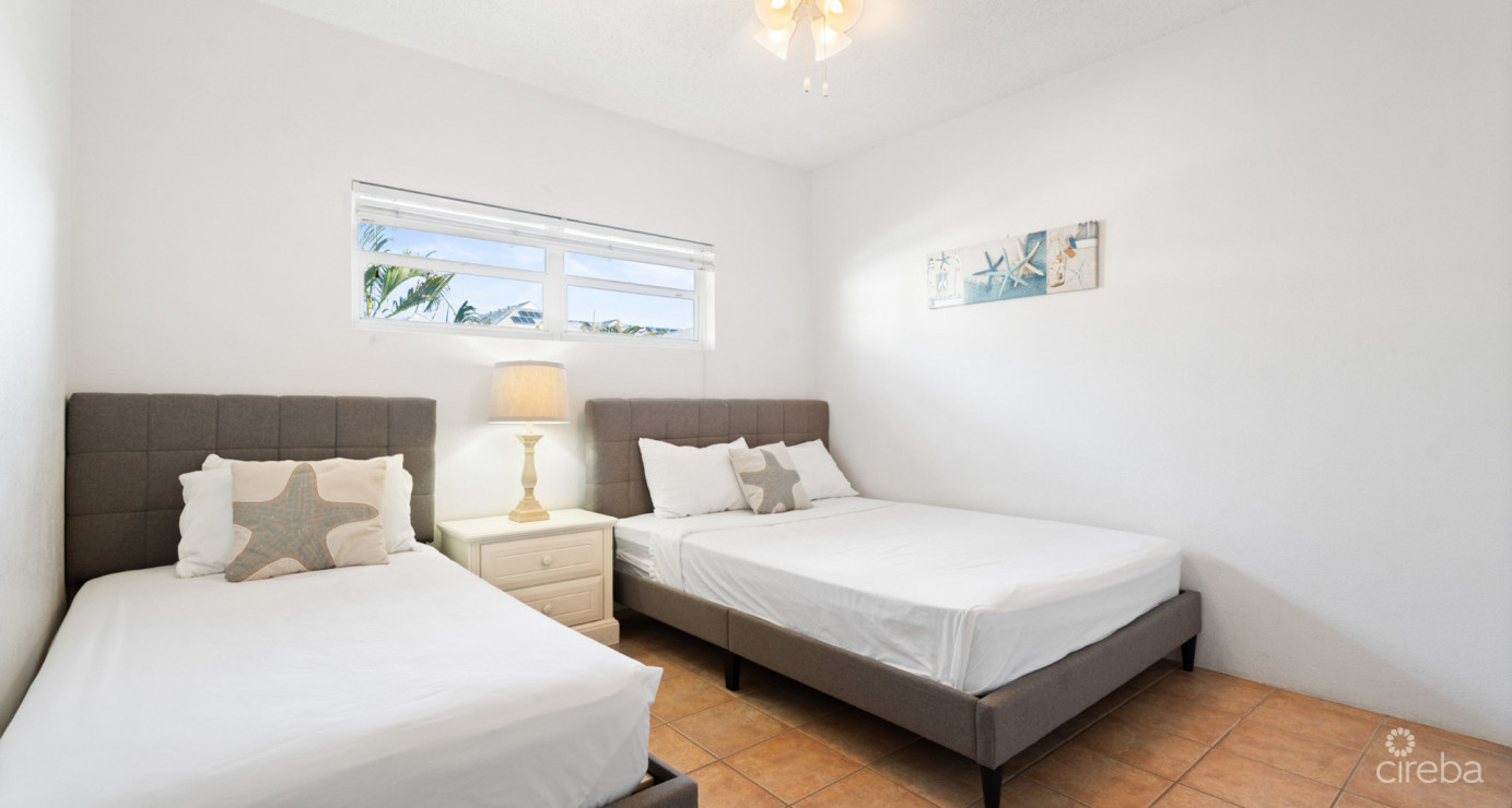 Plantation Village #44  Seven Mile Beach - Pool & Garden View Condo With Great Rental Income