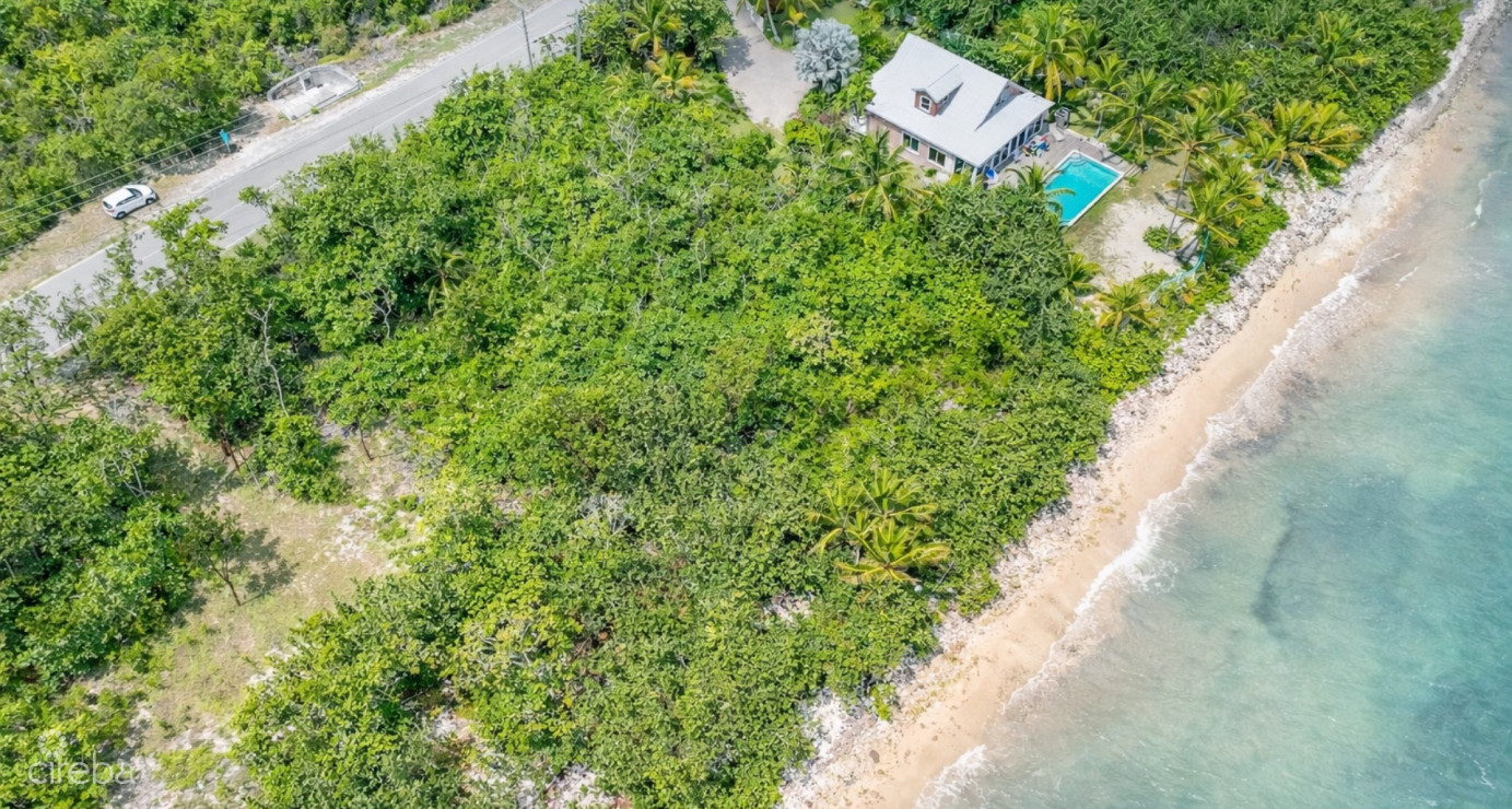 Rarely Available: Prime 0.52 Acre Oceanfront Parcel On Queen's Highway