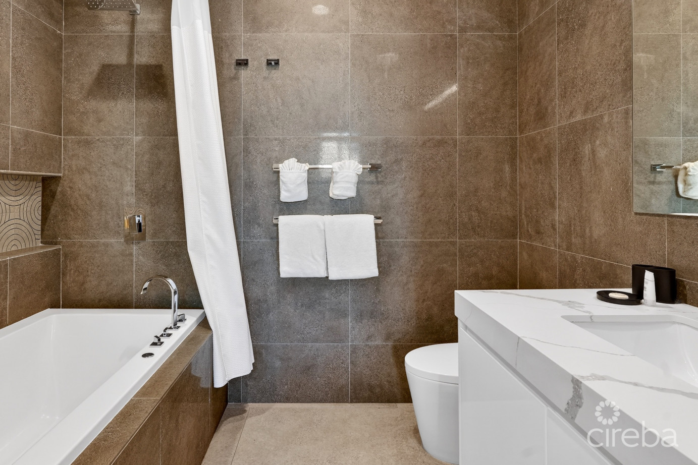 Rum Point Club Residences 203 Beachfront Condo