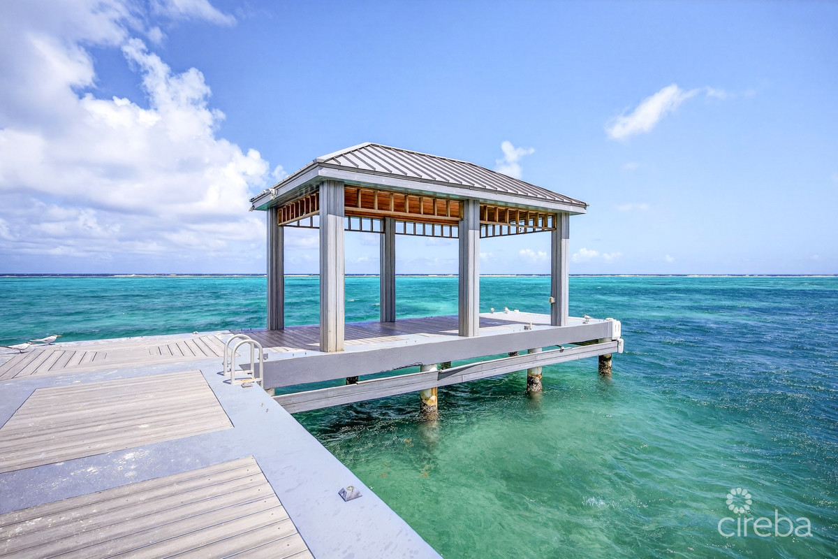 Rum Point Club Residences 203 Beachfront Condo