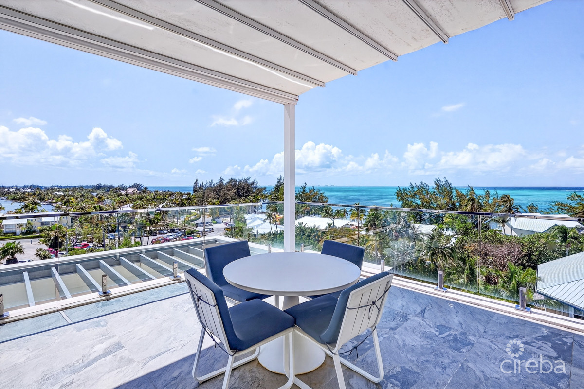 Rum Point Club Residences 203 Beachfront Condo