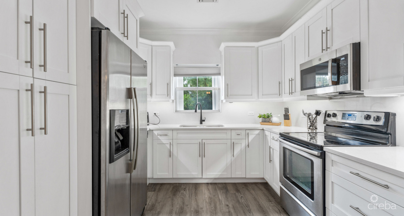 7 Snug Harbour Villas  Updated 2-bed, 2.5-bath In A Prime Seven Mile Beach Corridor Community