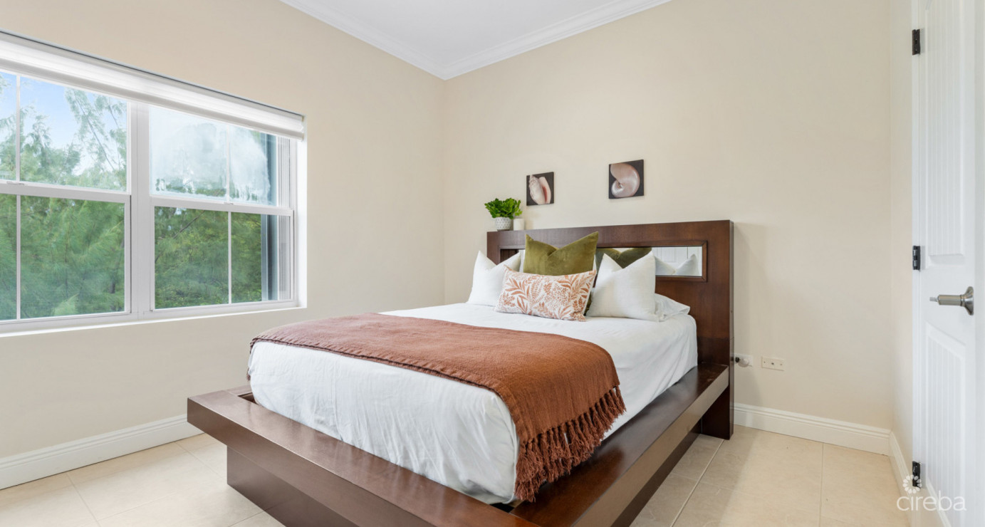 7 Snug Harbour Villas  Updated 2-bed, 2.5-bath In A Prime Seven Mile Beach Corridor Community