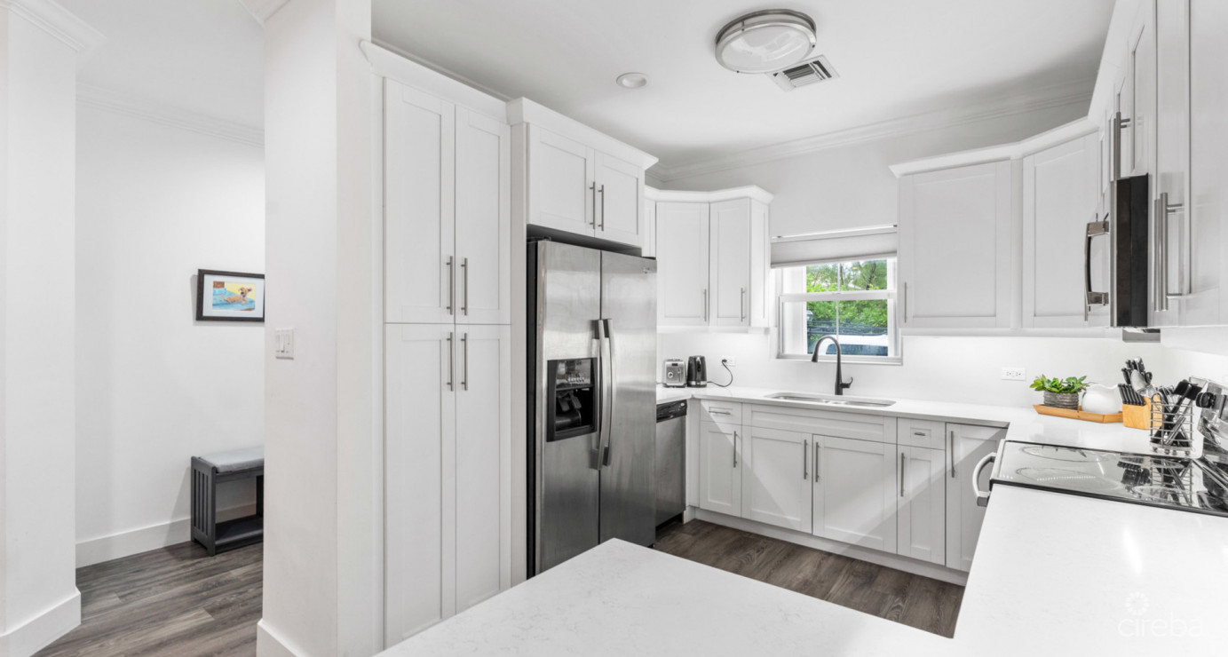 7 Snug Harbour Villas  Updated 2-bed, 2.5-bath In A Prime Seven Mile Beach Corridor Community