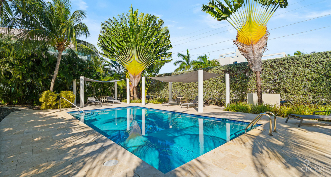 7 Snug Harbour Villas  Updated 2-bed, 2.5-bath In A Prime Seven Mile Beach Corridor Community