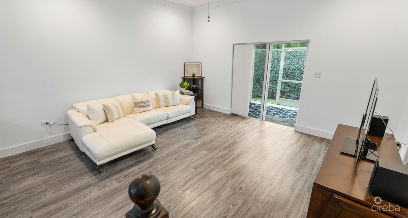 7 Snug Harbour Villas  Updated 2-bed, 2.5-bath In A Prime Seven Mile Beach Corridor Community