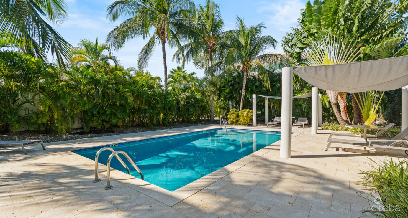 7 Snug Harbour Villas  Updated 2-bed, 2.5-bath In A Prime Seven Mile Beach Corridor Community