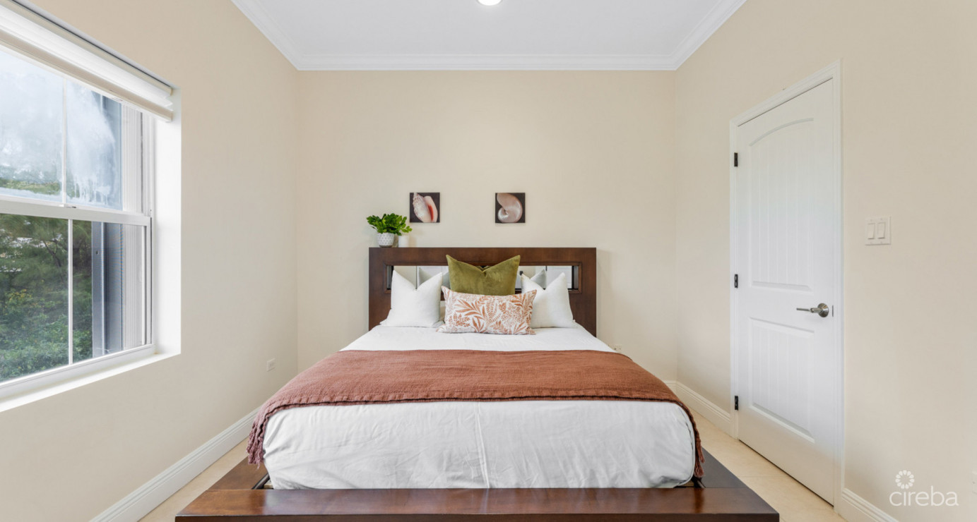 7 Snug Harbour Villas  Updated 2-bed, 2.5-bath In A Prime Seven Mile Beach Corridor Community