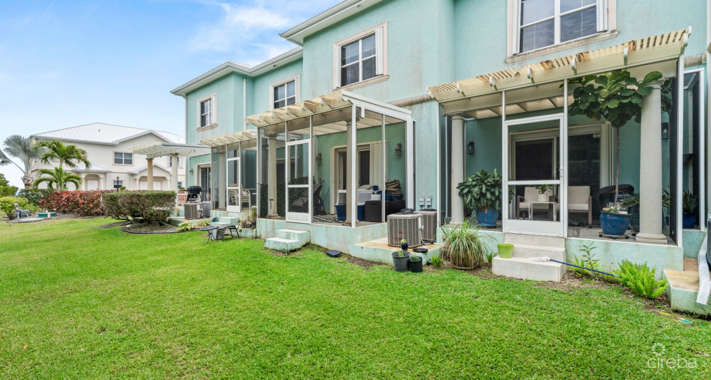 7 Snug Harbour Villas  Updated 2-bed, 2.5-bath In A Prime Seven Mile Beach Corridor Community