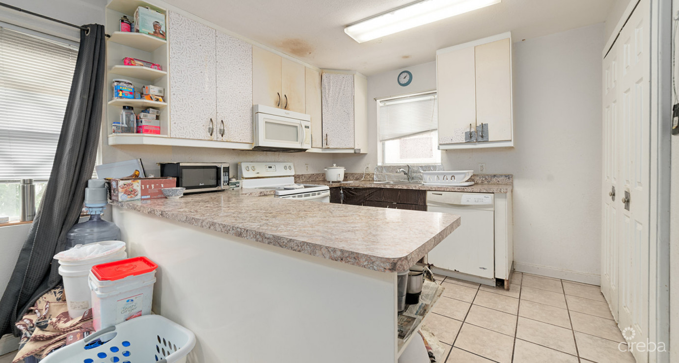 Great Opportunity With Renovation Potential - 3 Bedroom Triumph Village