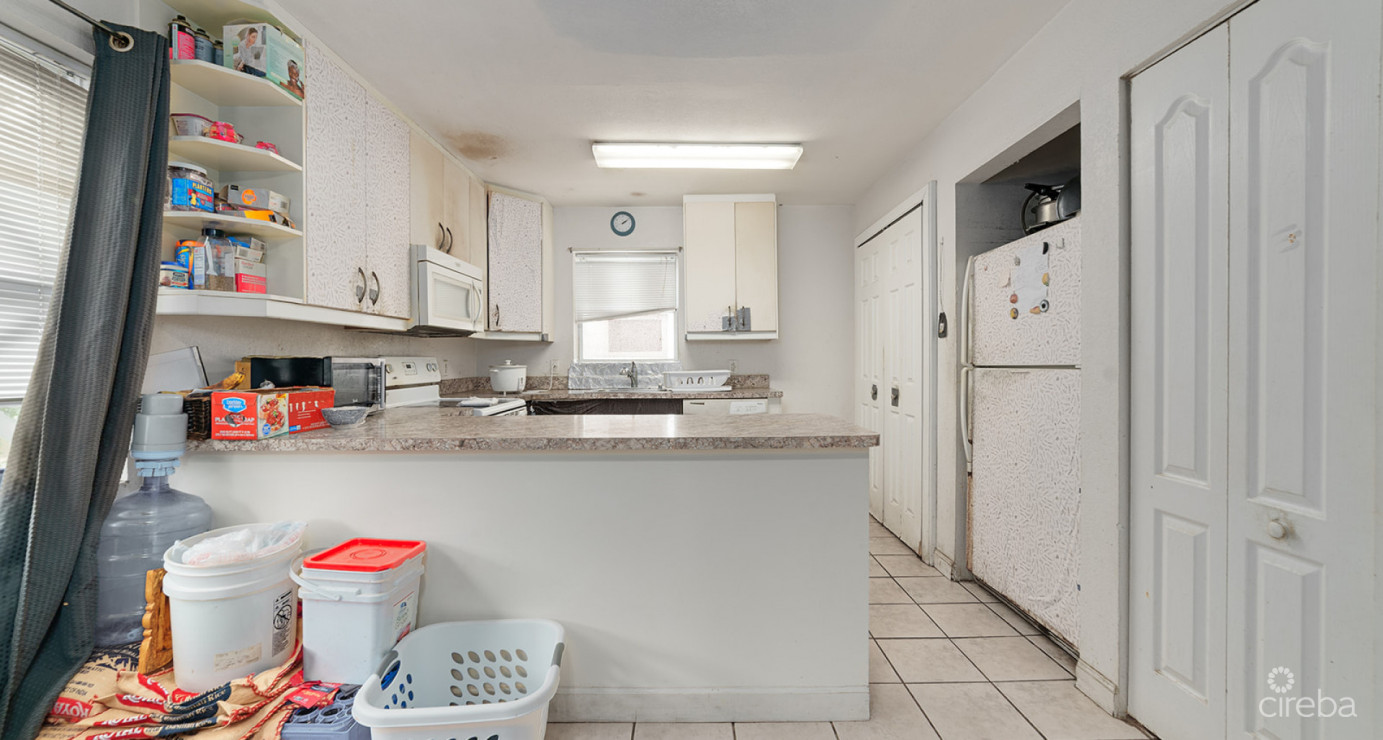 Great Opportunity With Renovation Potential - 3 Bedroom Triumph Village