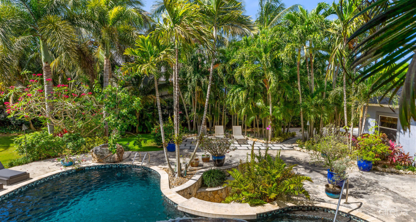 Private Savannah Sanctuary With Resort-style Grounds And Income Potential